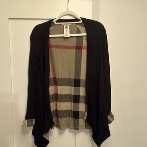 Black Burberry cardigan with classic Burberry print on the inside. Worn 5 times!